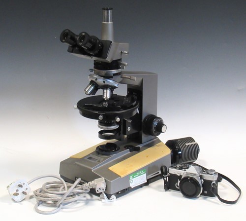Lot 164 - Olympus Polarize light trinocular microscope c....