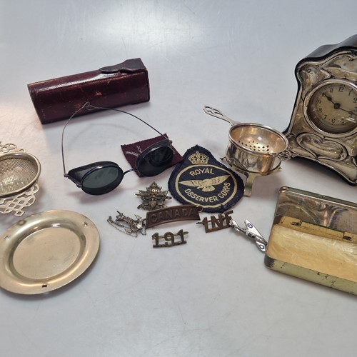 Lot 207 - A silver fronted desk clock, a silver tea...