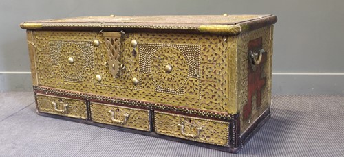 Lot 475 - A teak travelling trunk embellished with...