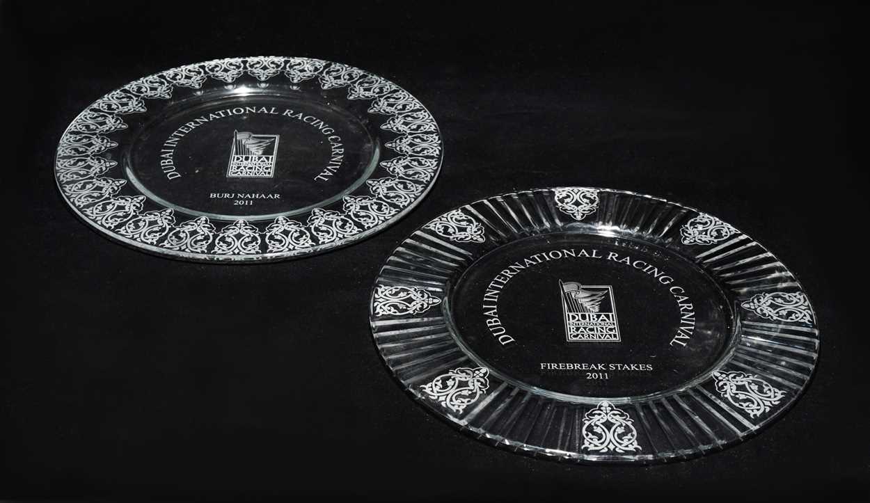 Lot 63 - A group of glass Dubai International Racing Carnival award plates, awarded to Frankie Dettori