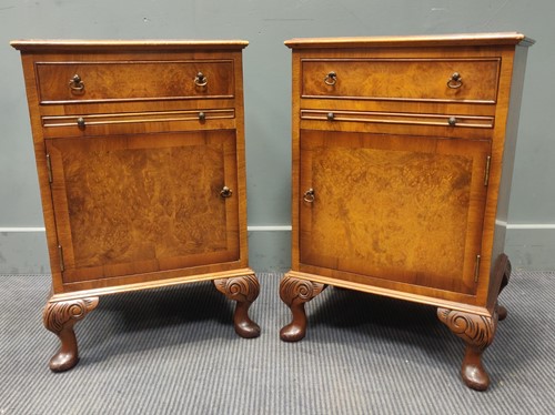 Lot 415 - A pair of figured walnut bedside cabinets with...