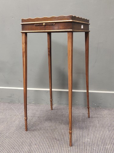 Lot 414 - A late 19th century mahogany kettle stand, 69...