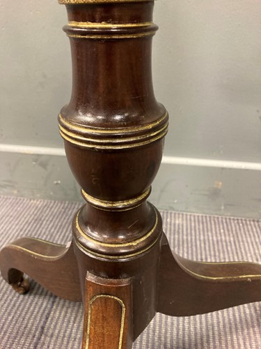 Lot 412 - A 19th century brass line inlaid globe stand...