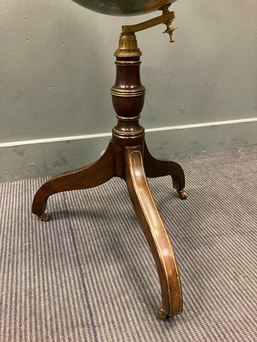 Lot 412 - A 19th century brass line inlaid globe stand...