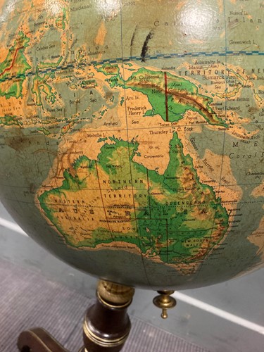 Lot 412 - A 19th century brass line inlaid globe stand...
