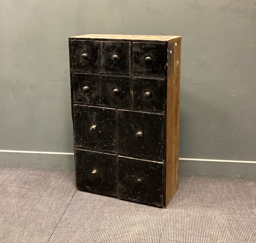 Lot 411 - A painted pine nest of spice drawers,...