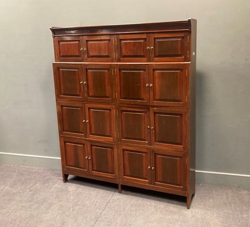 Lot 482 - A bank of mahogany lockers, 165.5 x 137.5 x 29cm