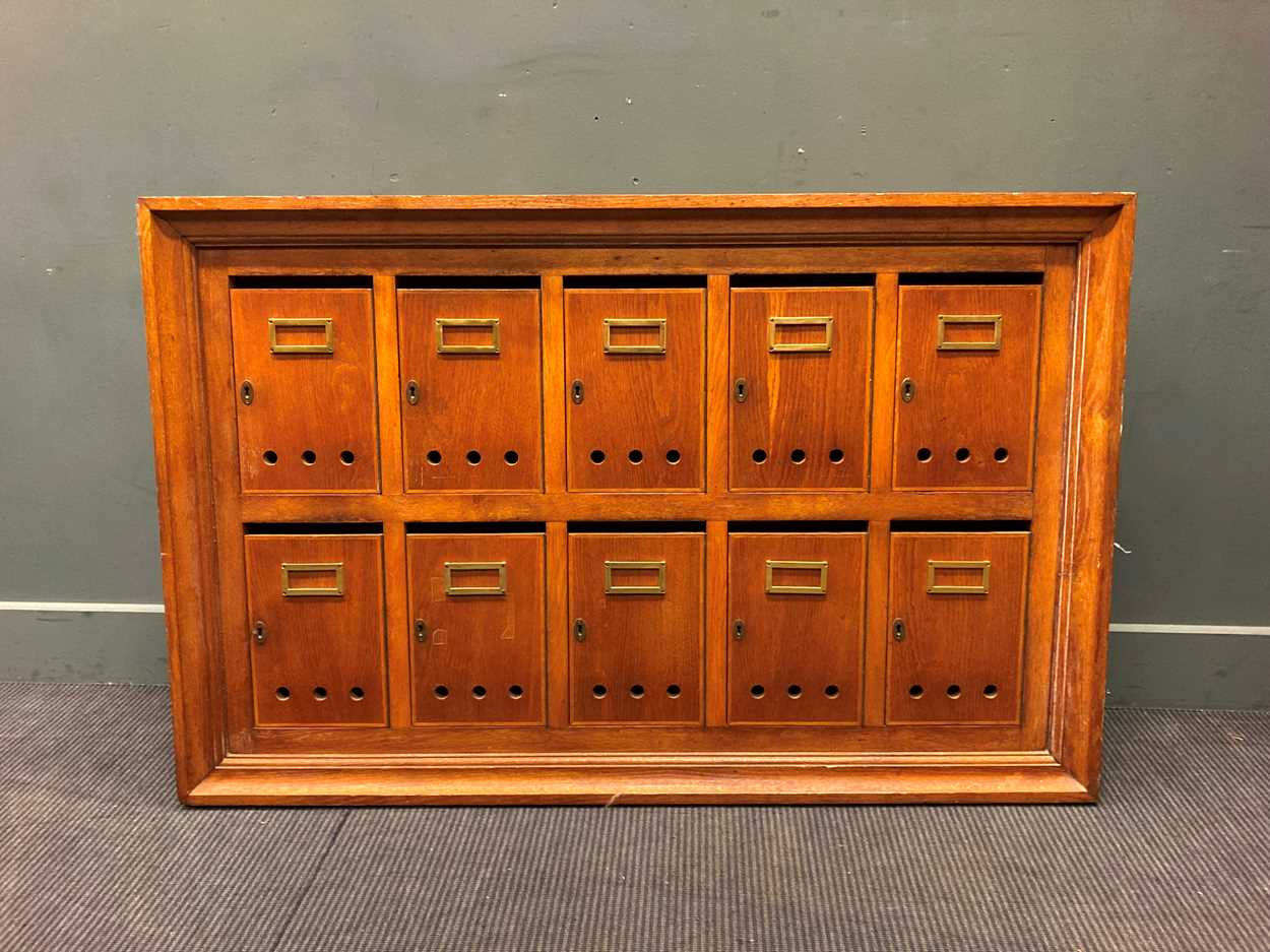 Lot 479 - A 20th century oak post box wall cabinet,...