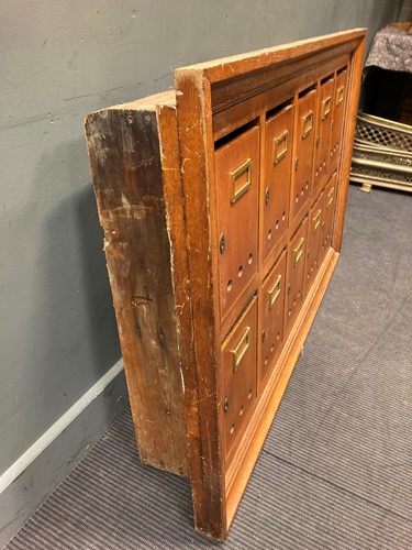 Lot 479 - A 20th century oak post box wall cabinet,...