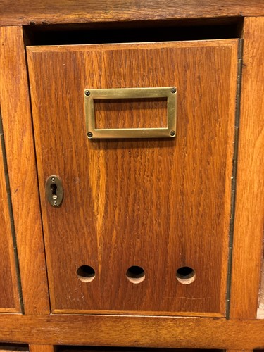 Lot 479 - A 20th century oak post box wall cabinet,...