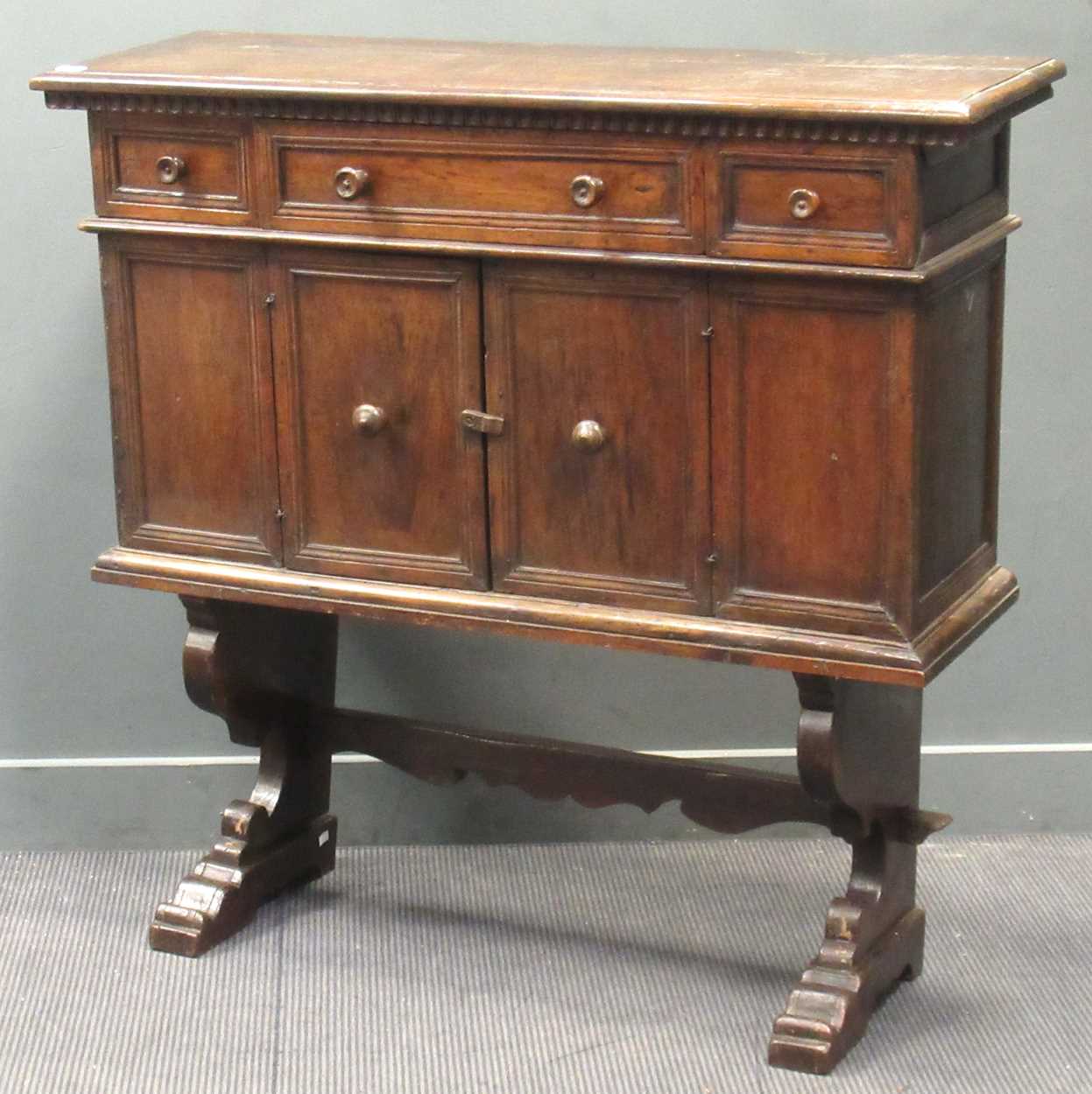 Lot 443 - A 17th century and later Spanish walnut chest...