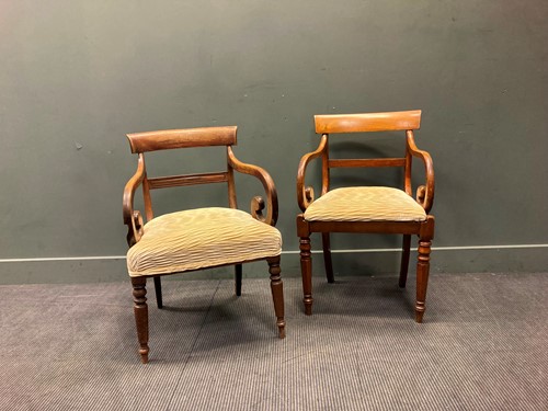 Lot 464 - A near pair of mahogany dining elbow chairs,...