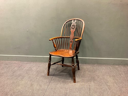 Lot 438 - An early 19th century beech and elm Windsor...