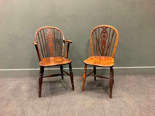 Lot 439 - A 19th century Windsor wheel back beech and...