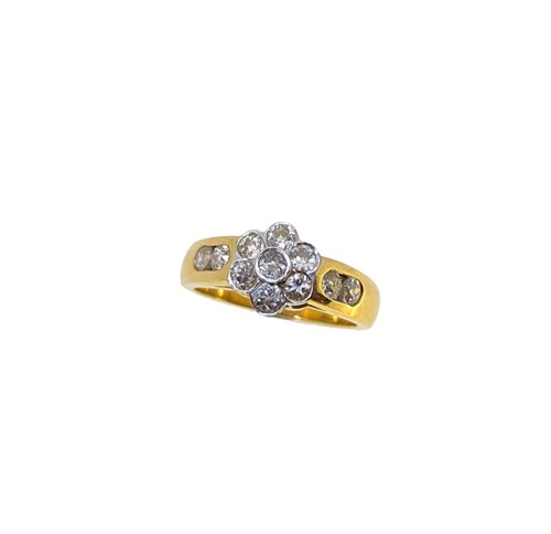 Lot 104 - An 18ct gold diamond cluster ring