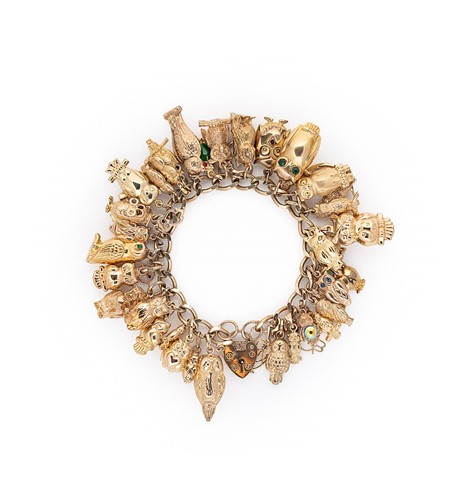 Lot 109 - A late 20th century charm bracelet