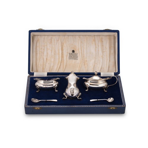 Lot 460 - An Elizabeth II silver three-piece cruet set, mark of Garrard & Company