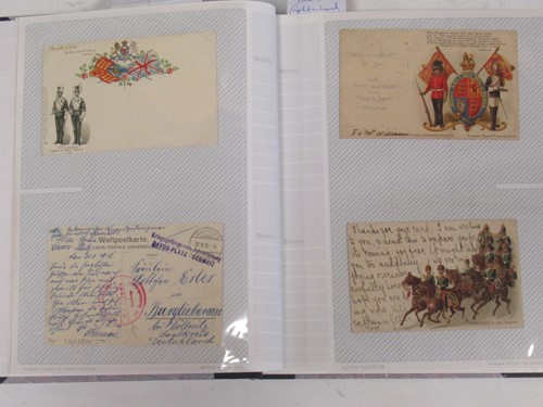 Lot 145 - First World War postcard album with c. 140...