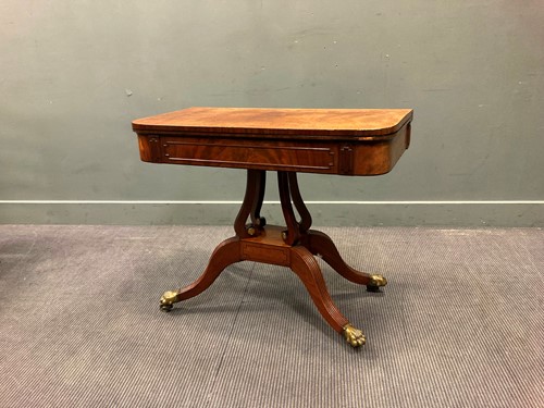 Lot 471 - A William IV mahogany card table, the fold...
