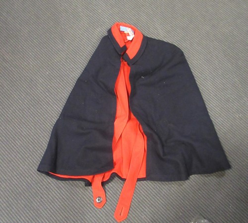 Lot 526 - A 1960/70's Nurses coat and petticoat in a...