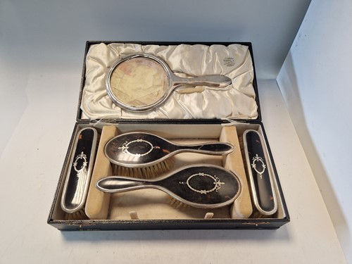 Lot 181 - A cased 6 piece silver and tortoiseshell...