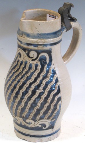 Lot 93 - An 18th-century Westerwald jug, the body with...