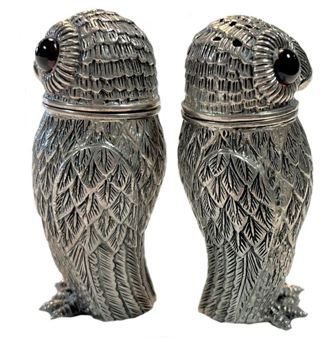 Lot 301 - A pair of Victorian cast silver novelty salt and pepper shakers