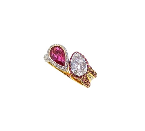 Lot 152 - A contemporary ruby and diamond ring