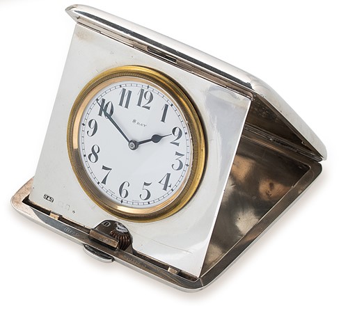 Lot 312 - Octava Watch Company, Granges - An early 20th century Sterling silver cased 8 day travelling clock