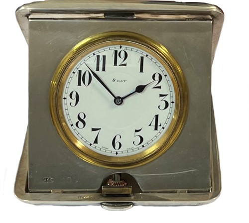 Lot 224 - Octava Watch Company, Granges - An early 20th century Sterling silver cased 8 day travelling clock