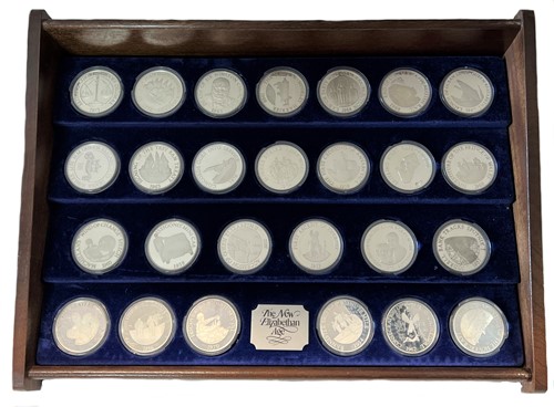 Lot 287 - 'The New Elizabethan Age' - A cased collection of twenty six silver commemorative coins