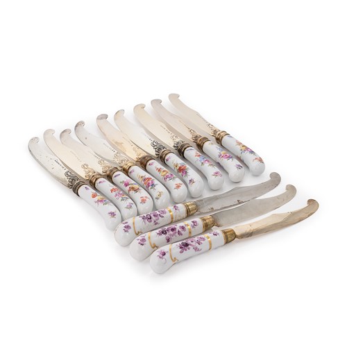 Lot 334 - A set of nine late 19th century German metalwares vermeil bladed fruit knives with three additions