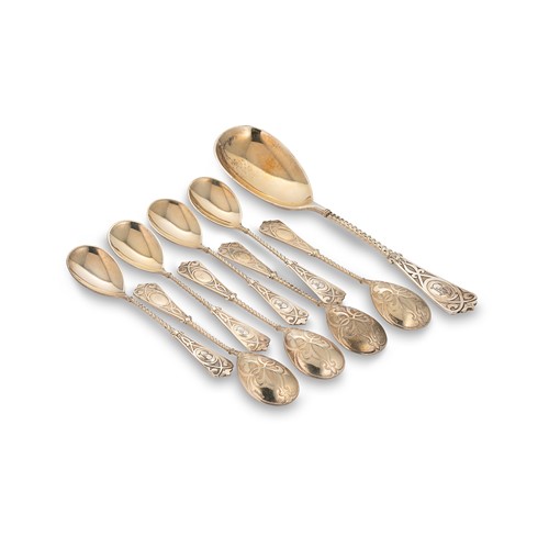 Lot 330 - A set of eight late 19th century German metalwares vermeil fruit spoons with matching serving spoon