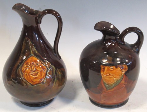 Lot 156 - Two Royal Doulton Dewars Whisky ewers, tallest...