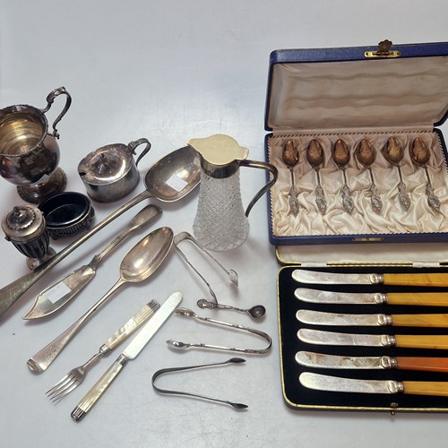 Lot 196 - A small collection of silverware including...