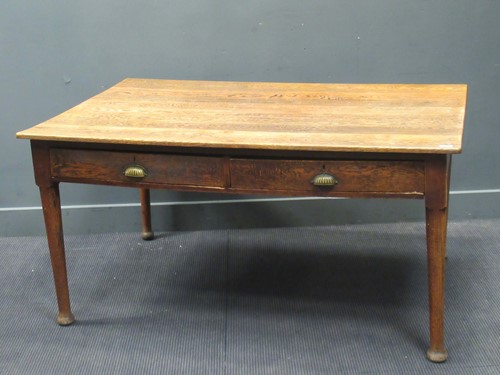 Lot 407 - An Edwardian two drawer table on turned legs,...