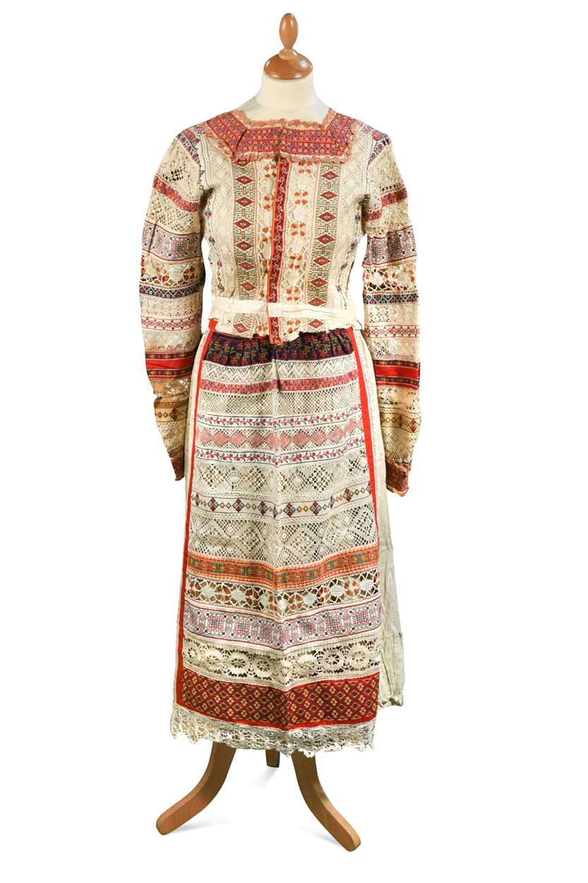 Lot 395 - An embroidered Russian poneva dress, early 20th century