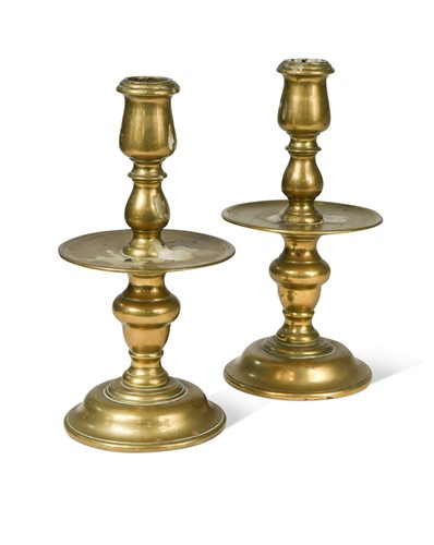 Lot 350 - A pair of brass candlesticks, possibly Spanish, 18th century