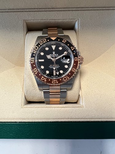 Lot 222 - Rolex - A steel and 'Everose' 'Oyster Perpetual Date GMT Master II' wristwatch
