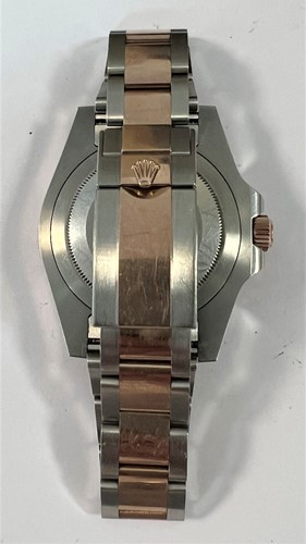 Lot 222 - Rolex - A steel and 'Everose' 'Oyster Perpetual Date GMT Master II' wristwatch