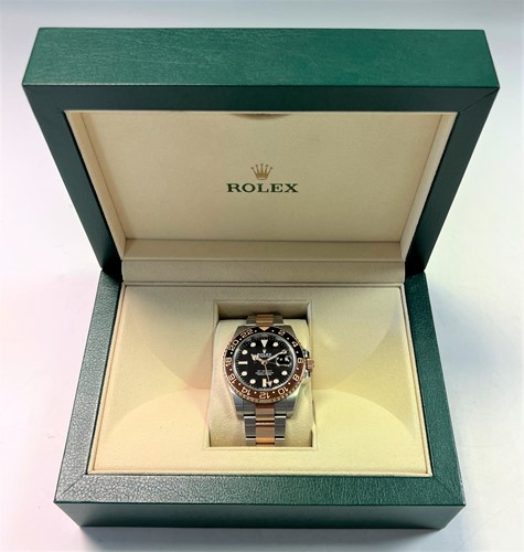 Lot 222 - Rolex - A steel and 'Everose' 'Oyster Perpetual Date GMT Master II' wristwatch
