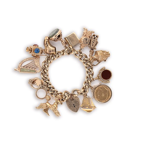 Lot 76 - A late 20th century charm bracelet