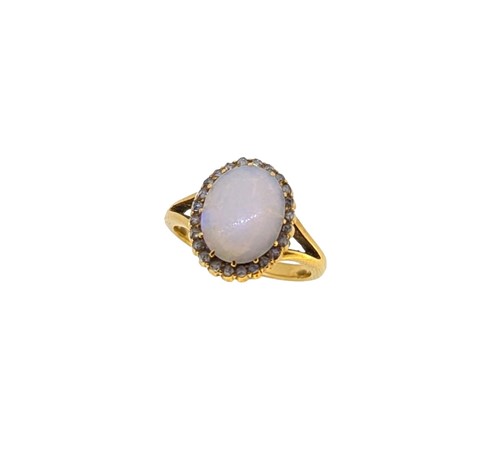 Lot 82 - An opal and diamond cluster ring