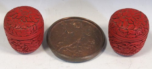 Lot 48 - A pair of Chinese lacquer pots with foliate...