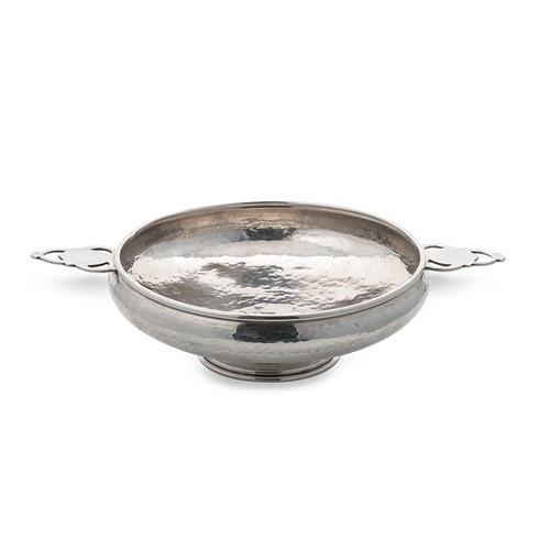 Lot 418 - A George V silver ‘Arts & Crafts’ style dish, mark of A.E. Jones