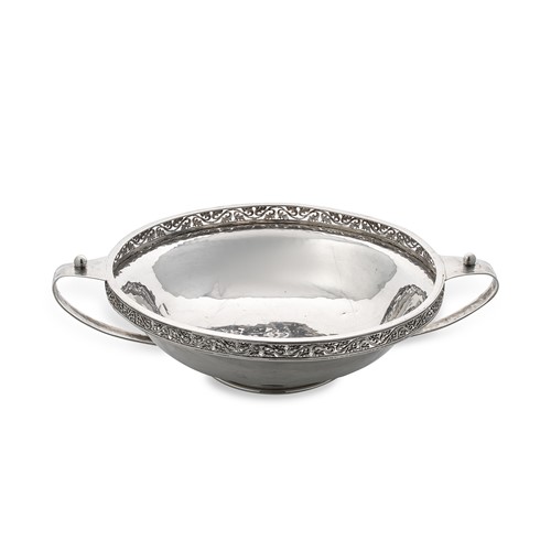 Lot 429 - A George V silver ‘Arts & Crafts’ style silver dish, mark of A.E. Jones