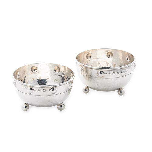Lot 417 - A pair of George V silver ‘Arts & Crafts’ style bowls, mark of A.E. Jones