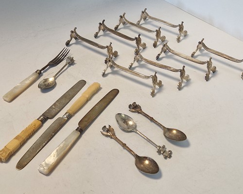 Lot 183 - 8 pairs of French silver plated knife rests,...