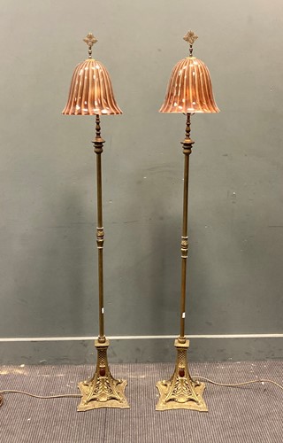 Lot 418 - A pair of brass standard lamps with...