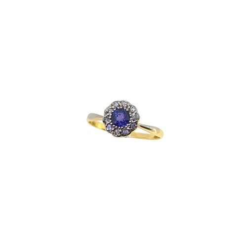 Lot 118 - A synthetic colour change corundum and diamond cluster ring